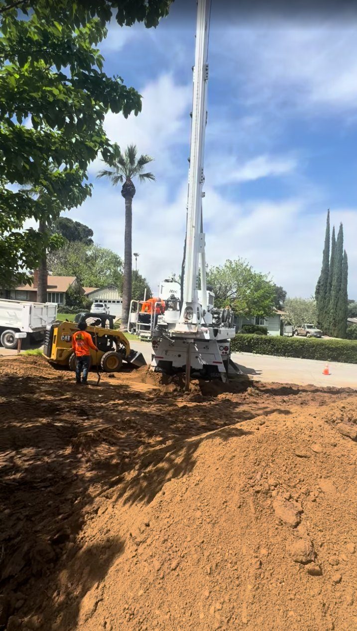 Drilling crew on a front-yard job