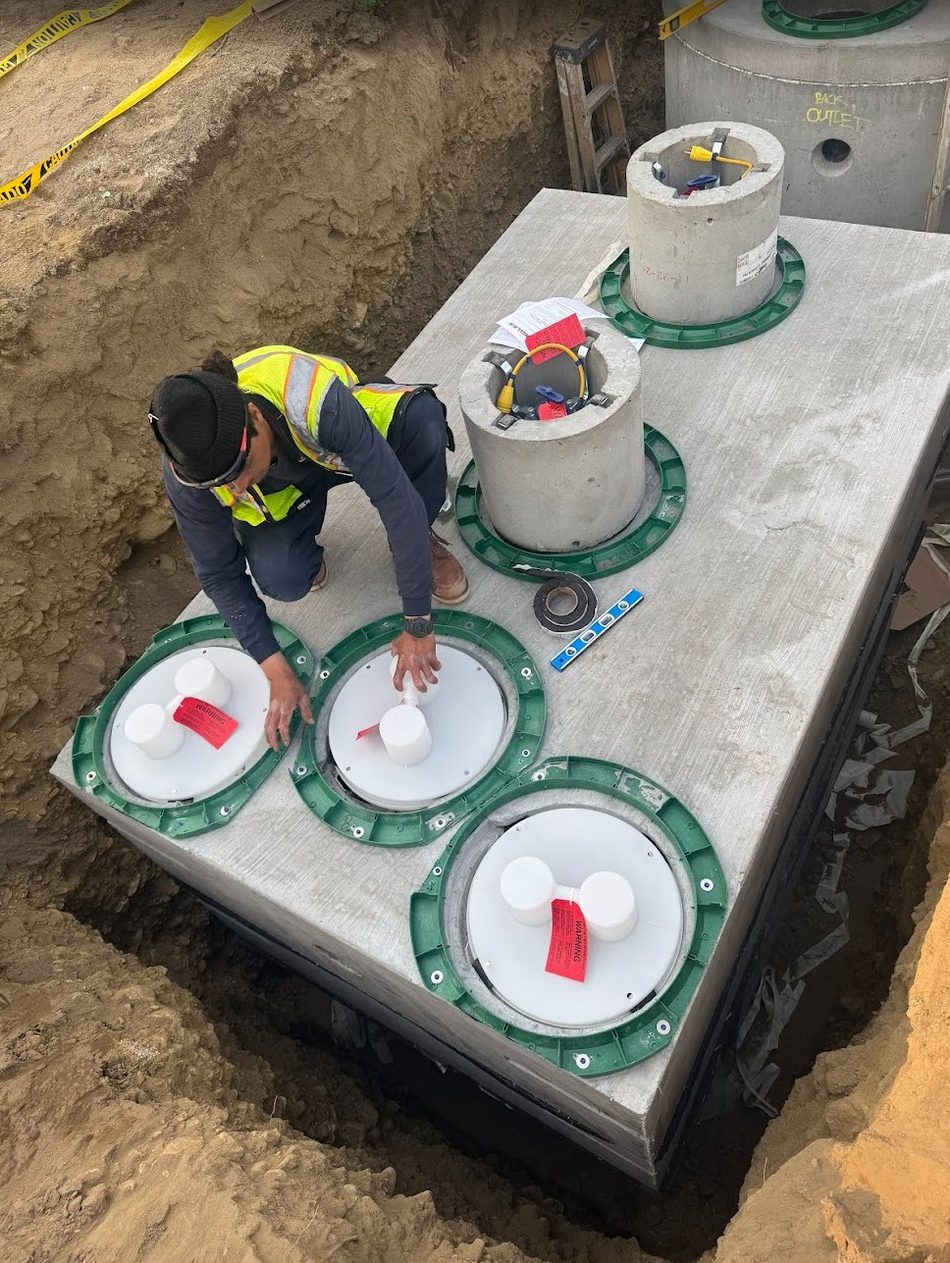 Setting risers and filters on a multi-compartment treatment system